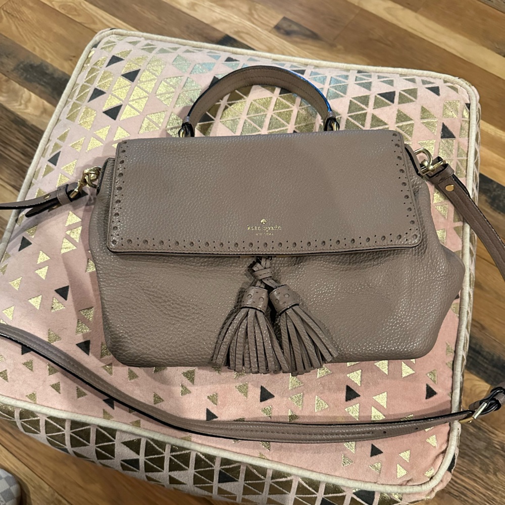 Kate Spade light brown satchel bag with tassels